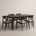 Table en bois noire avec 5 chaises rembourrées